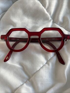 Translucent Ruby Red Angular Round Glasses